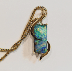 colourful opal jewellery with gold chain